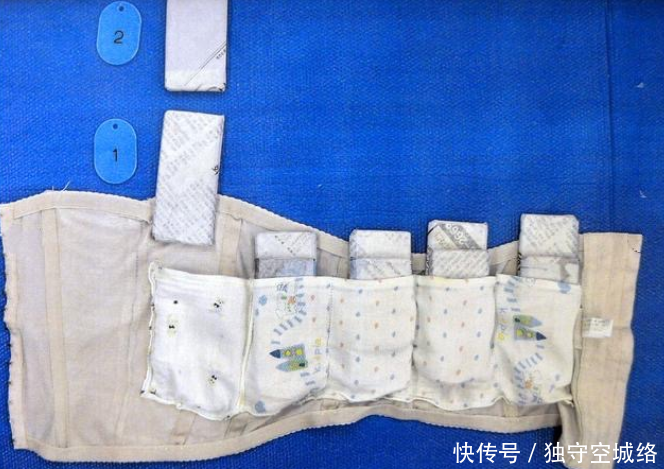 女子过安检，胸部大引起注意，脱掉后安检人员傻眼了！