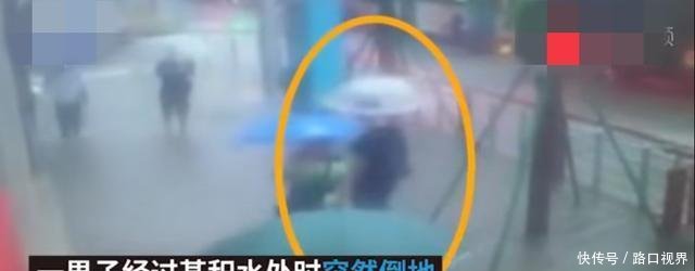 大连暴雨导致路面积水严重存漏电隐患, 一男子