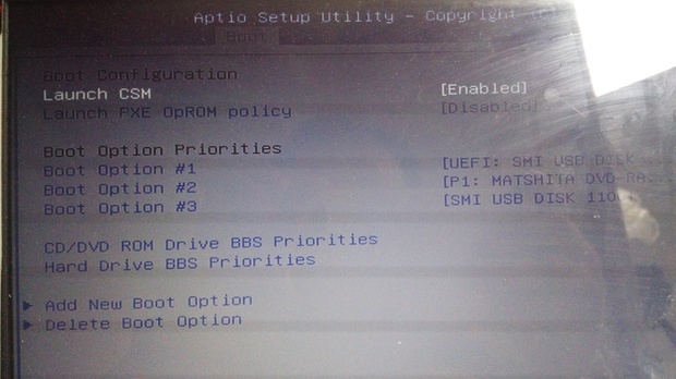 华硕笔记本R557L 用U盘装完系统重启进不了系
