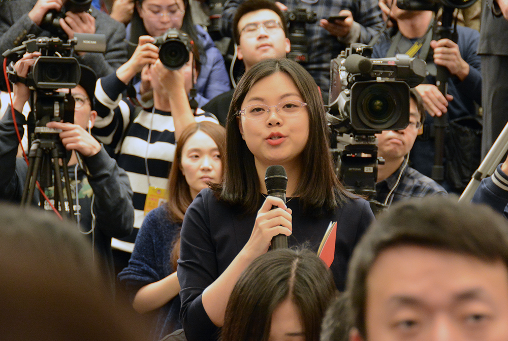 大会新闻发言人王国庆回答记者提问