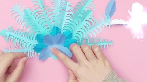 龙背天空艺术创想 剪纸冰雪孔雀