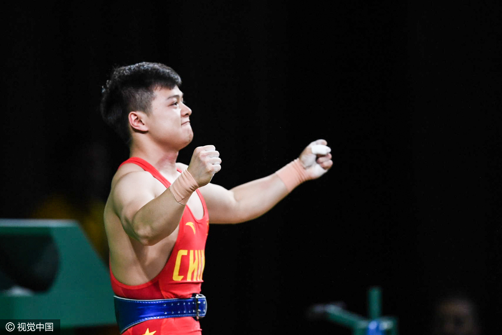 【转载】组图-男举56kg级 龙清泉破世界纪录摘金